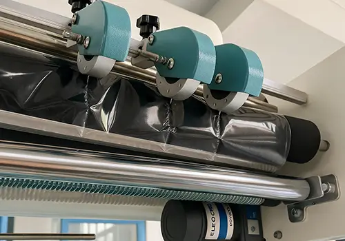 film perforator on L bar sealer