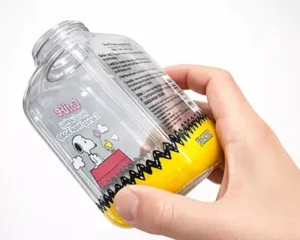 Label sleeve shrinking in steam heat tunnel